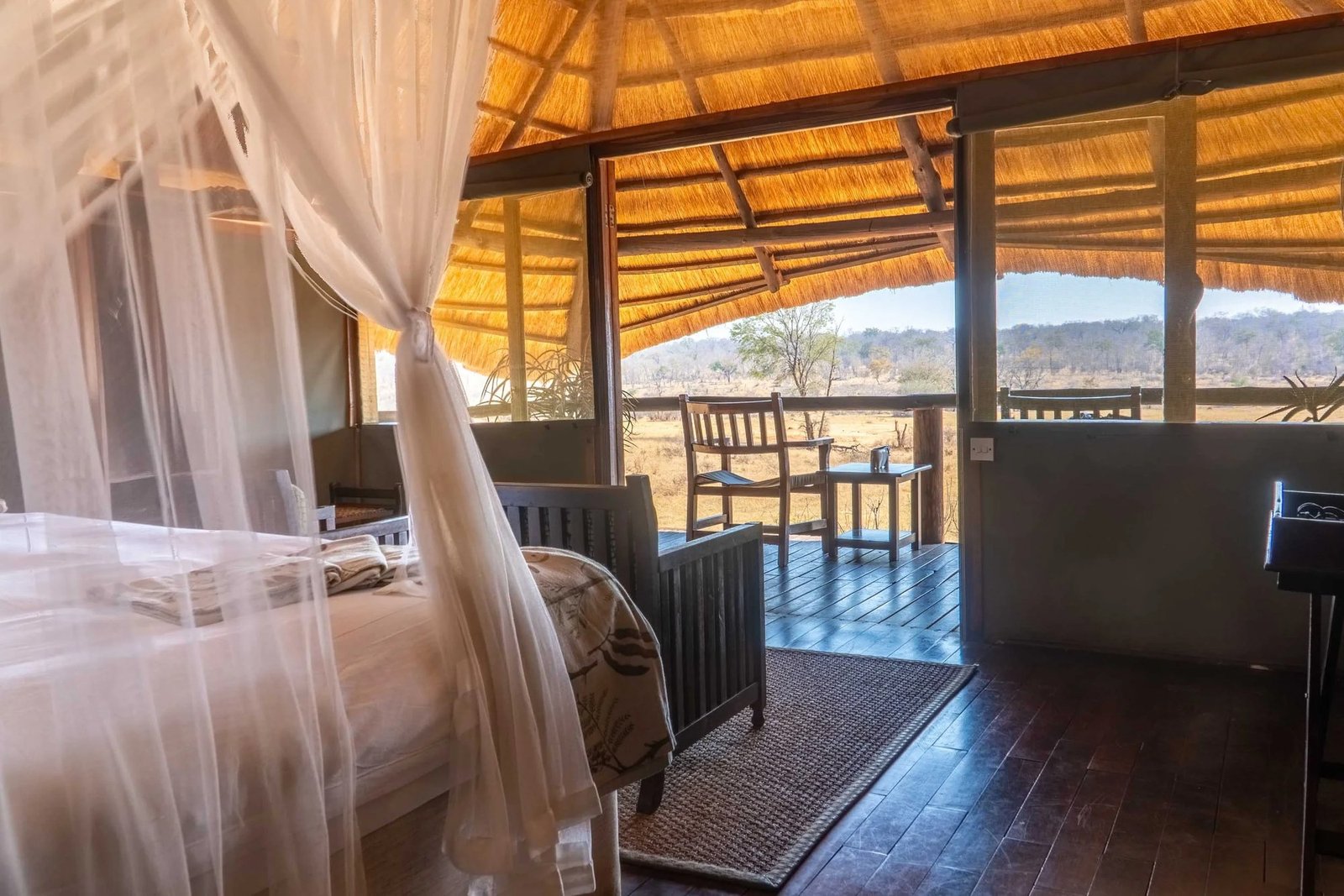 At Ivory Lodge, a bedroom opens onto a private deck facing the bush