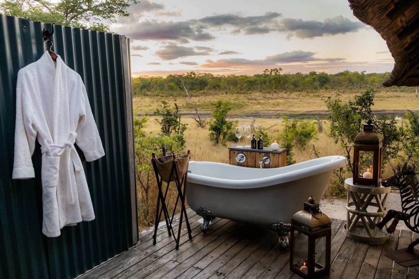 A freestanding bathtub at Khulu Bush Camp sits on a private deck overlooking the plain
