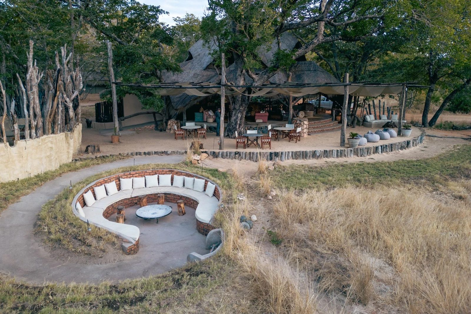 Sable Valley Lodge appears from the air in Hwange, with its sunken fire pit in front