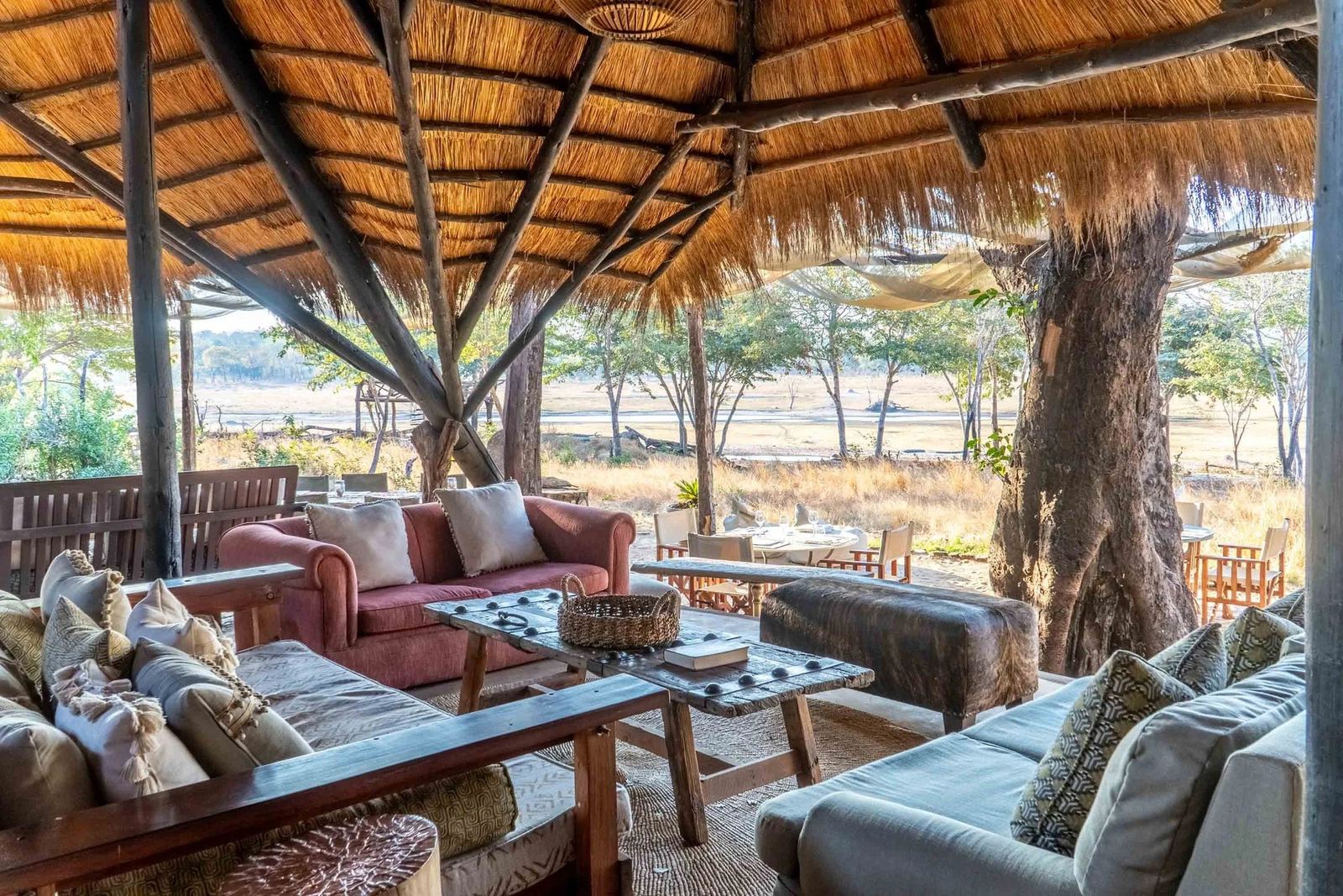 Sable Valley Lodge's main lounge sits under thatch, open to the plain in front