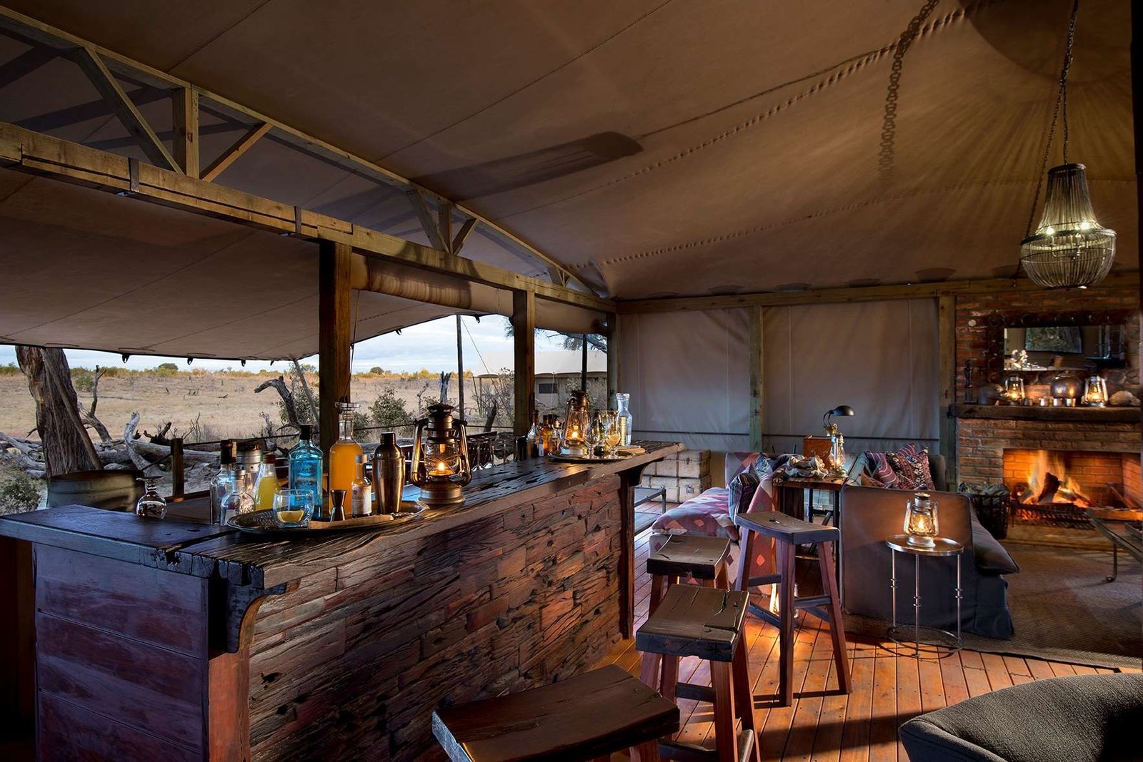 Somalisa Expeditions' main tent holds the lounge and bar, with a fireplace